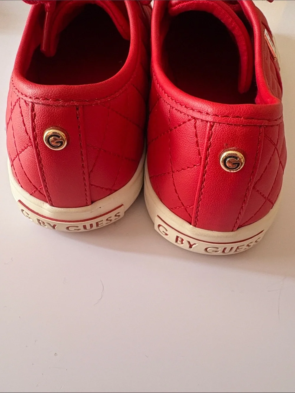 GUESS size 7.5 red quilted leather Sneakers with Gold Hardware very good shape